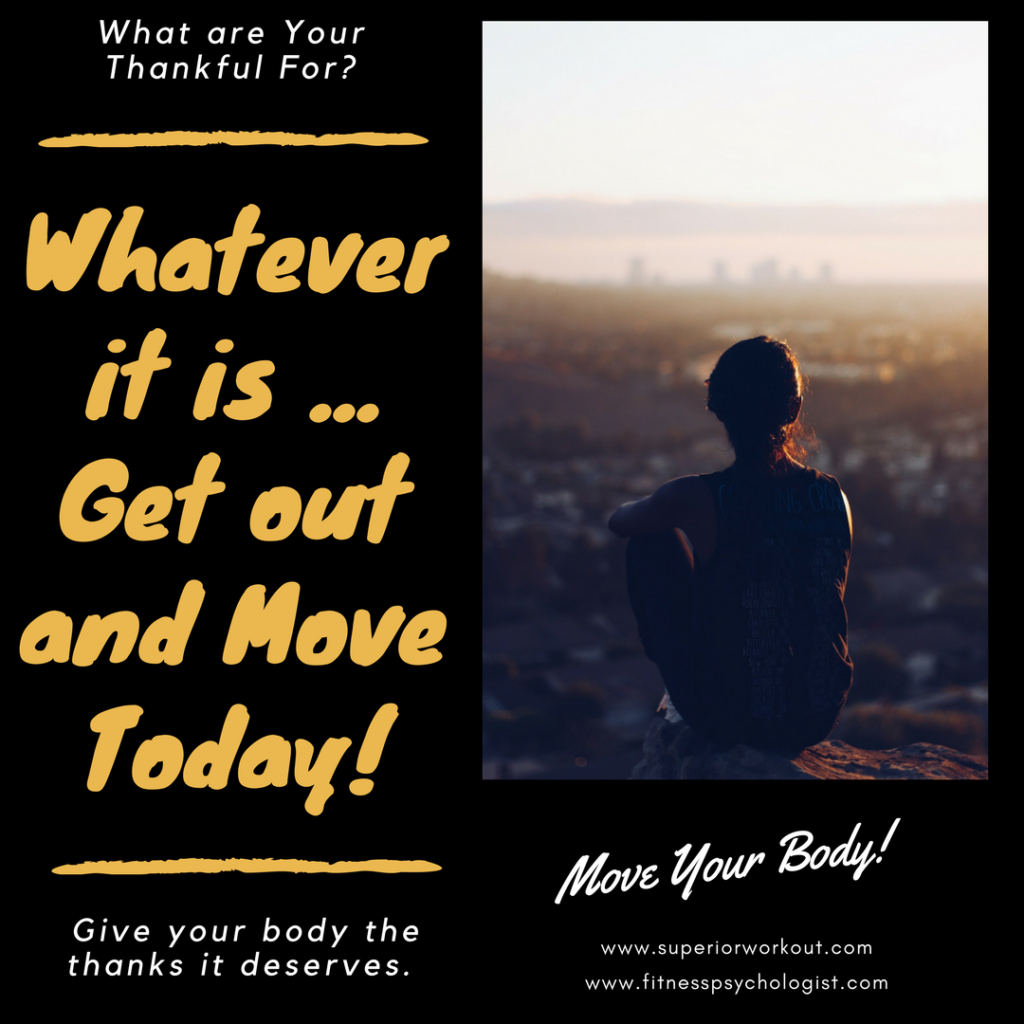 Motivational poster: silhouetted person overlooking city sunrise