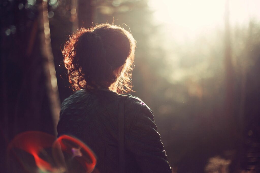 woman sitting in chair in the sun