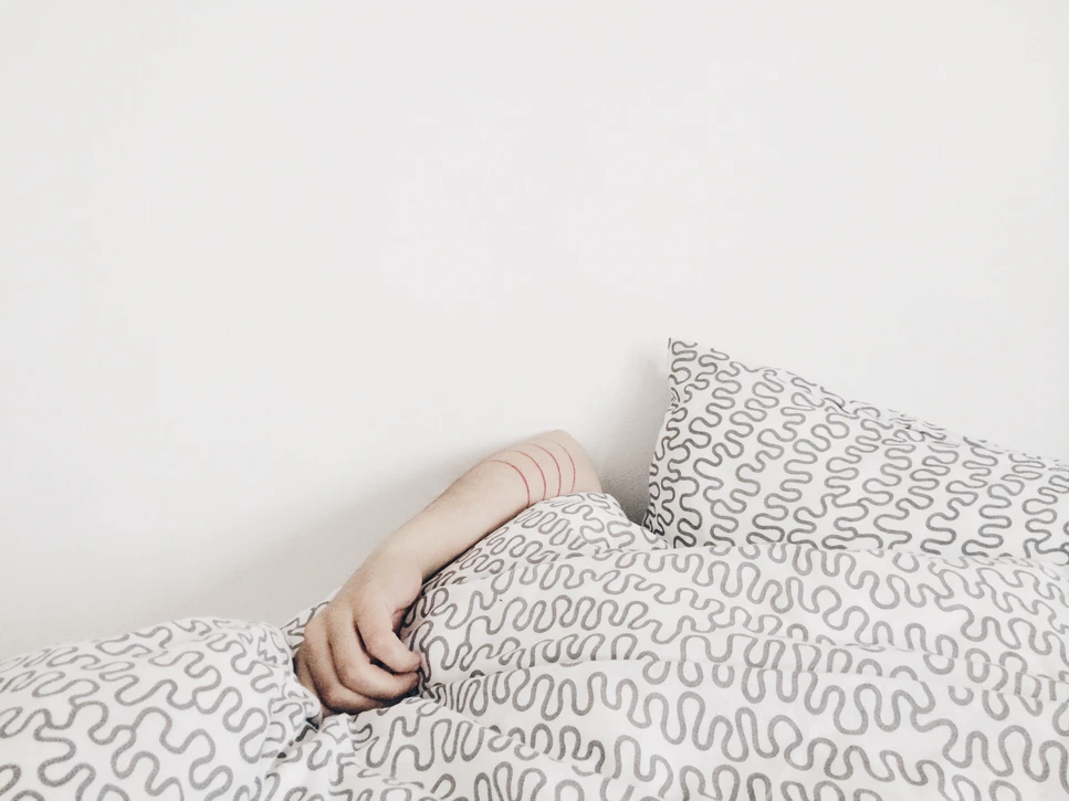 Person Hiding under Pillow