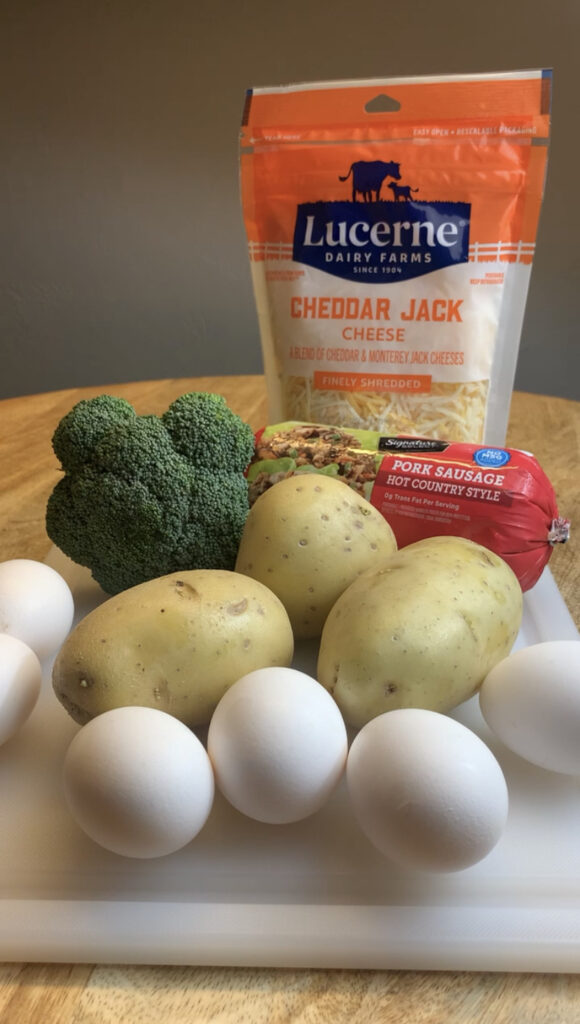 Eggs, potatoes, broccoli, cheese, and sausage