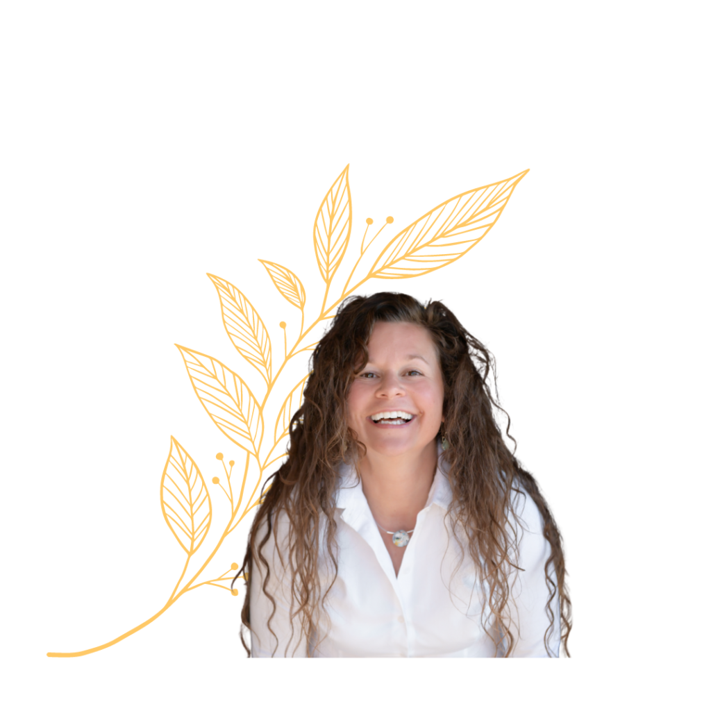 Smiling woman with long curly hair, gold leaves